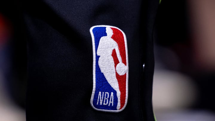 Apr 29, 2024; New Orleans, Louisiana, USA; Detailed view go the NBA logo between the New Orleans Pelicans and the Oklahoma City Thunder r during the second half of game four of the first round for the 2024 NBA playoffs at Smoothie King Center. Mandatory Credit: Stephen Lew-USA TODAY Sports