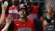 Chicago White Sox third baseman Miguel Vargas (20) celebrates after scoring against the Minnesota Twins at Rate Field. 
