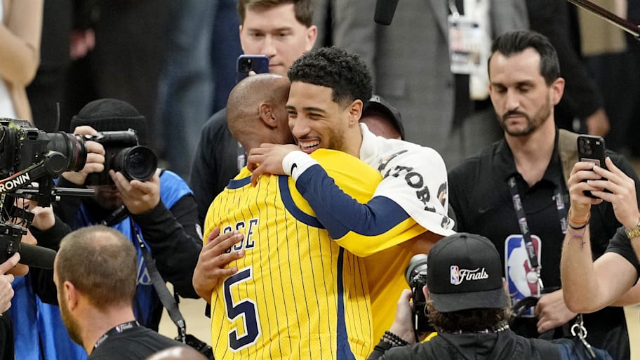 Reggie Miller hugs Indiana Pacers guard Tyrese Haliburton after winning game six of the 2025 NBA Finals between the Oklahoma City Thunder and the Indiana Pacers at Gainbridge Fieldhouse. | Kyle Terada-Imagn Images