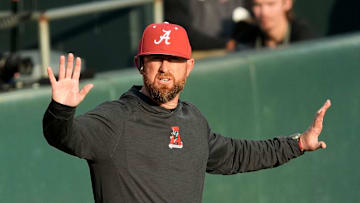 Feb 18, 2025; Tuscaloosa, Alabama, USA; Alabama baseball head coach Rob Vaughn gestures for a timeout during the game with Middle Tennessee State at Sewell-Thomas Stadium.