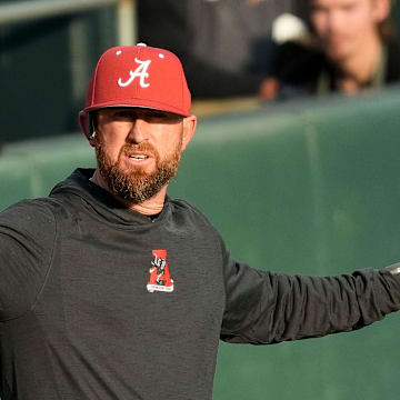 Feb 18, 2025; Tuscaloosa, Alabama, USA; Alabama baseball head coach Rob Vaughn gestures for a timeout during the game with Middle Tennessee State at Sewell-Thomas Stadium.
