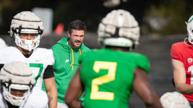 Oregon head coach Dan Lanning watches practice with the Ducks Thursday, April 11, 2024, at the Hatfield-Dowlin Complex in Eug