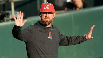 Feb 18, 2025; Tuscaloosa, Alabama, USA; Alabama baseball head coach Rob Vaughn gestures for a timeout during the game with Middle Tennessee State at Sewell-Thomas Stadium.