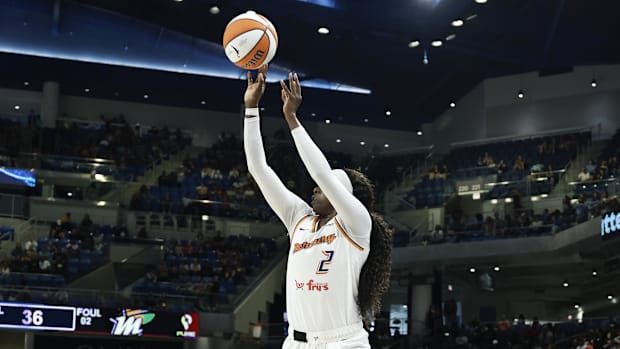 A photo of Kahleah Copper taking a jumper