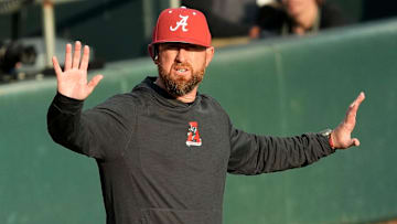 Feb 18, 2025; Tuscaloosa, Alabama, USA; Alabama baseball head coach Rob Vaughn gestures for a timeout during the game with Middle Tennessee State at Sewell-Thomas Stadium.