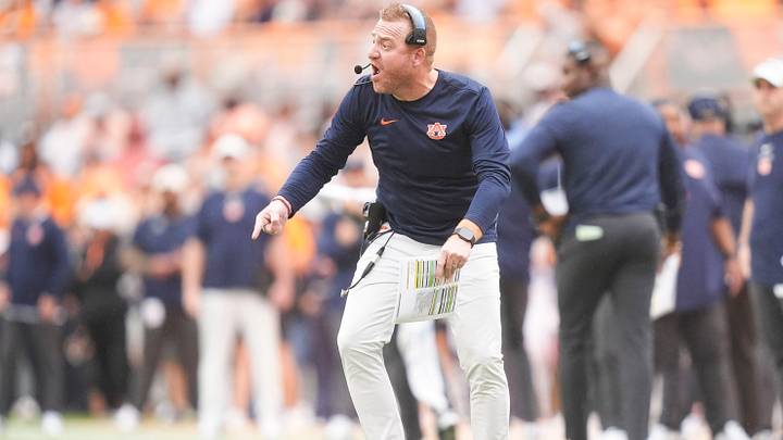 Auburn coach Alex Golesh yells to an official during a game between Tennessee and Auburn in Neyland Stadium in Knoxville, Tennessee, Oct. 3, 2026.