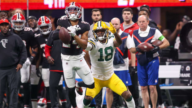 Atlanta Falcons cornerback A.J. Terrell (24) breaks up a pass against the Green Bay Packers  
