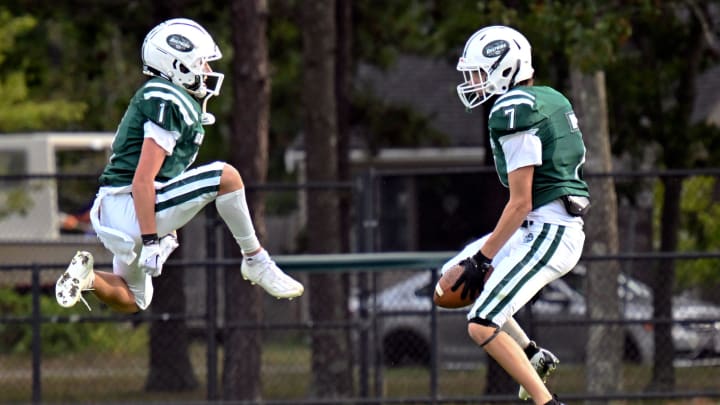 SOUTH YARMOUTH    09/30/22   Walter Mayo (7) celebrates with his Dennis-Yarmouth teammate Peyton Kellett after catching a pass to score against Nantucket.  This score brought them to 20-7 over Nantucket.

093022rs02 Jpg