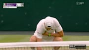An injured Grigor Dimitrov clutches his chest in pain during his match vs. Jannik Sinner at Wimbledon on July 7, 2025.