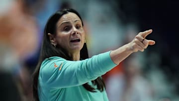 Aug 3, 2025; Uncasville, Connecticut, USA; New York Liberty head coach Sandy Brondello watches from the sideline as they take on the Connecticut Sun at Mohegan Sun Arena. Mandatory Credit: David Butler II-Imagn Images