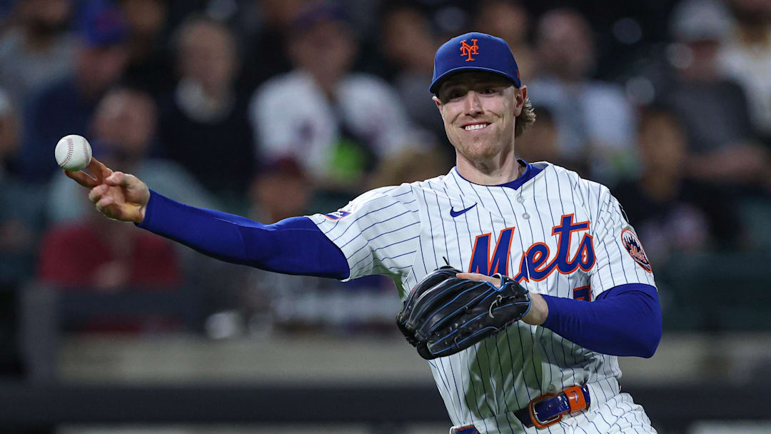 Sep 17, 2025; New York City, New York, USA; New York Mets third baseman Brett Baty (7) throws the ball to first base for an out during the first inning against the San Diego Padres  at Citi Field. Mandatory Credit: Vincent Carchietta-Imagn Images