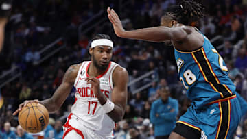 Jan 28, 2023; Detroit, Michigan, USA;  Houston Rockets forward Tari Eason (17) dribbles defended by