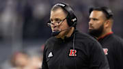 Dec 26, 2024; Phoenix, AZ, USA; Rutgers Scarlet Knights head coach Greg Schiano against the Kansas State Wildcats during the Rate Bowl at Chase Field. Mandatory Credit: Mark J. Rebilas-Imagn Images