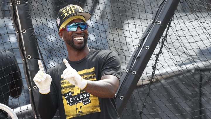 Jul 20, 2024; Pittsburgh, Pennsylvania, USA;  Pittsburgh Pirates designated hitter Andrew McCutchen (22) gestures at the batting cage before a game against the Philadelphia Phillies at PNC Park. Mandatory Credit: Charles LeClaire-USA TODAY Sports