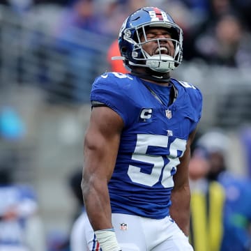 Dec 31, 2023; East Rutherford, New Jersey, USA; New York Giants linebacker Bobby Okereke (58) celebrates his sack against the Los Angeles Rams during the second quarter at MetLife Stadium.  