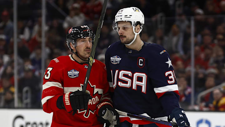 Feb 20, 2025; Boston, MA, USA; [Imagn Images direct customers only] Team Canada forward Brad Marchand (63) and United States forward Auston Matthews (34) during the 4 Nations Face-Off ice hockey championship game at TD Garden. Mandatory Credit: Winslow Townson-Imagn Images