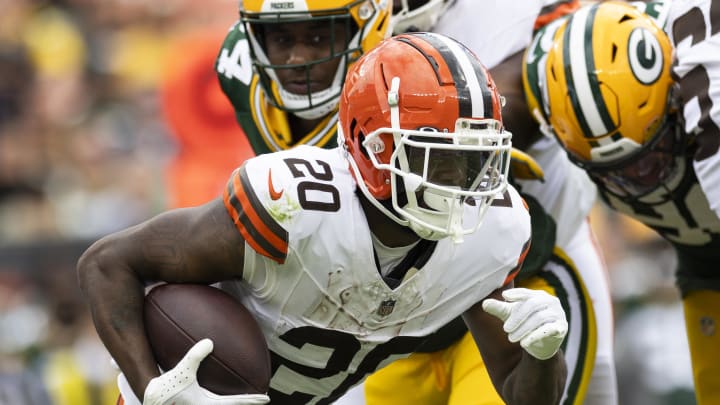 Aug 10, 2024; Cleveland, Ohio, USA; Cleveland Browns running back Pierre Strong Jr. (20) runs the ball against the Green Bay Packers during the second quarter at Cleveland Browns Stadium. Mandatory Credit: Scott Galvin-USA TODAY Sports