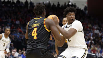 Mar 20, 2024; Dayton, OH, USA; Montana State Bobcats forward Brandon Walker (2) plays the ball defended by Grambling State Tigers forward Antwan Burnett (4) in the second half at UD Arena. Mandatory Credit: Rick Osentoski-Imagn Images