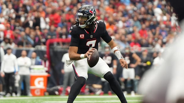 Nov 2, 2025; Houston, Texas, USA; Houston Texans quarterback C.J. Stroud (7) scrambles during the first half against the Denv
