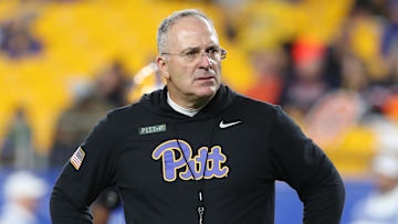 Nov 9, 2024; Pittsburgh, Pennsylvania, USA;  Pittsburgh Panthers head coach Pat Narduzzi observes warm ups before the game against the Virginia Cavaliers at Acrisure Stadium. Mandatory Credit: Charles LeClaire-Imagn Images