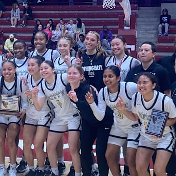 Mitty's girls basketball team pose after winning its ninth CCS Open title in 10 years