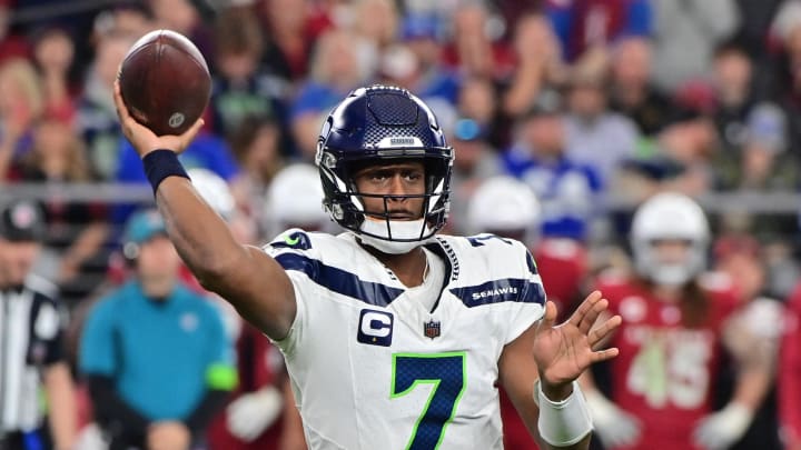 Jan 7, 2024; Glendale, Arizona, USA; Seattle Seahawks quarterback Geno Smith (7) throws in the second half against the Arizona Cardinals at State Farm Stadium. Mandatory Credit: Matt Kartozian-USA TODAY Sports