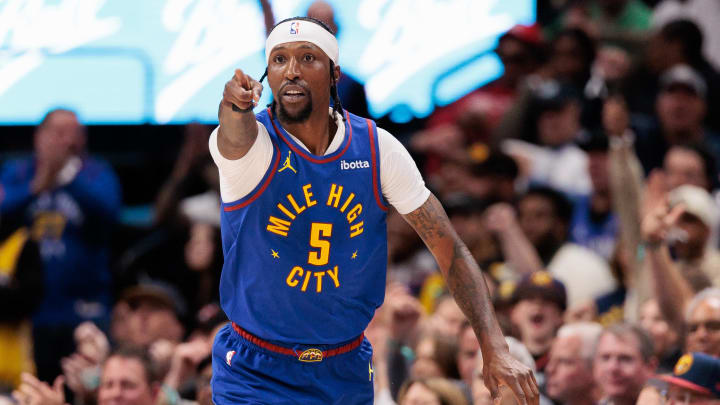 Apr 20, 2024; Denver, Colorado, USA; Denver Nuggets guard Kentavious Caldwell-Pope (5) reacts to a three point shot during the third quarter against the Los Angeles Lakers in game one of the first round for the 2024 NBA playoffs at Ball Arena. Mandatory Credit: Andrew Wevers-USA TODAY Sports