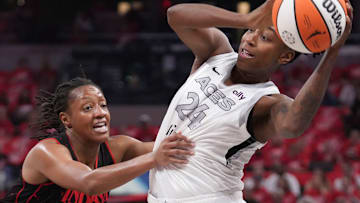 Las Vegas Aces guard Jewell Loyd (24) is defended by Indiana Fever guard Kelsey Mitchell (0) during Game 4 of the WNBA semifinals on Sunday, Sept. 28, 2025, at Gainbridge Fieldhouse in Indianapolis. The Fever defeated the Aces 90-83.