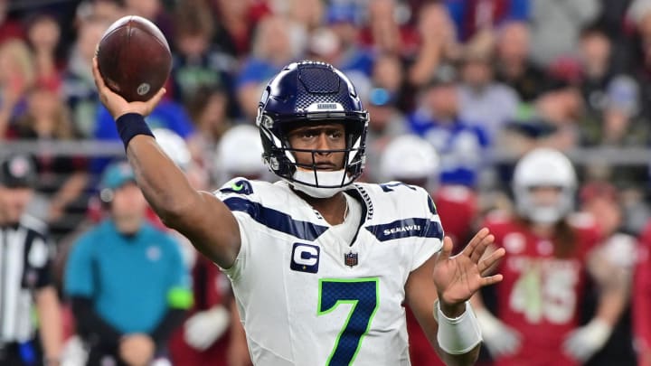 Jan 7, 2024; Glendale, Arizona, USA; Seattle Seahawks quarterback Geno Smith (7) throws in the second half against the Arizona Cardinals at State Farm Stadium. Mandatory Credit: Matt Kartozian-USA TODAY Sports