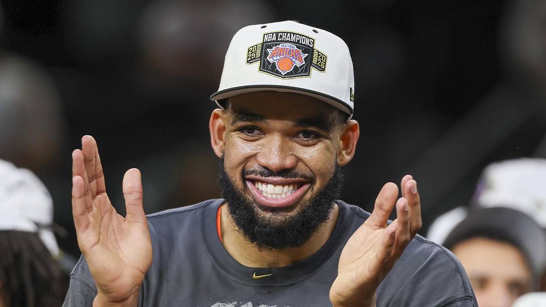 Jun 13, 2026; San Antonio, Texas, USA; New York Knicks center Karl-Anthony Towns (32) celebrates after the Knicks defeat the San Antonio Spurs during game five of the 2026 NBA Finals at Frost Bank Center. Mandatory Credit: Geoff Burke-Imagn Images