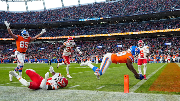 Denver Broncos wide receiver Marvin Mims Jr. (19) scores a touchdown in the second half against the Kansas City Chiefs.