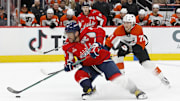 Oct 23, 2024; Washington, District of Columbia, USA; Washington Capitals left wing Alex Ovechkin (8) skates with the puck as Philadelphia Flyers right wing Tyson Foerster (71) chase in the first period at Capital One Arena. Mandatory Credit: Geoff Burke-Imagn Images