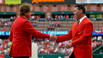 Apr 13, 2015; St. Louis, MO, USA; St. Louis Cardinals former manager Tony Larussa shakes hands with former player Jim Edmonds before the game between the St. Louis Cardinals and the Milwaukee Brewers at Busch Stadium. 