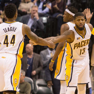 Mar 15, 2017; Indianapolis, IN, USA; Indiana Pacers forward Paul George (13) and guard Jeff Teague (44) celebrate in the second half of the game against the Charlotte Hornets at Bankers Life Fieldhouse. Indiana Pacers beat the Charlotte Hornets 98-77.Mandatory Credit: Trevor Ruszkowski-USA TODAY Sports