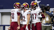 Washington Commanders wide receiver Terry McLaurin celebrates with Luke McCaffrey