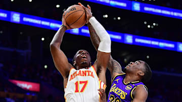 Atlanta Hawks center Onyeka Okongwu moves to the basket against Los Angeles Lakers guard Shake Milton.