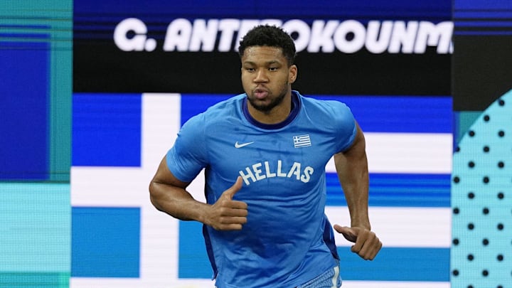 Greece small forward Giannis Antetokounmpo runs onto the court before the game against Germany during a menís basketball quarterfinal game during the Paris 2024 Olympic Summer Games at Accor Arena on August 6, 2024.