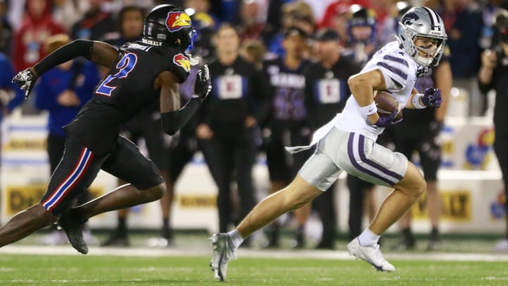 Kansas State freshman wide receiver Jayce Brown (1) runs the ball during the fourth quarter of Saturday's Sunflower Showdown against Kansas inside David Booth Kansas Memorial Stadium.