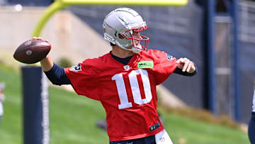May 11, 2024; Foxborough, MA, USA; New England Patriots quarterback Drake Maye (10) throws a pass at the New England Patriots rookie camp at Gillette Stadium.  Mandatory Credit: Eric Canha-USA TODAY Sports