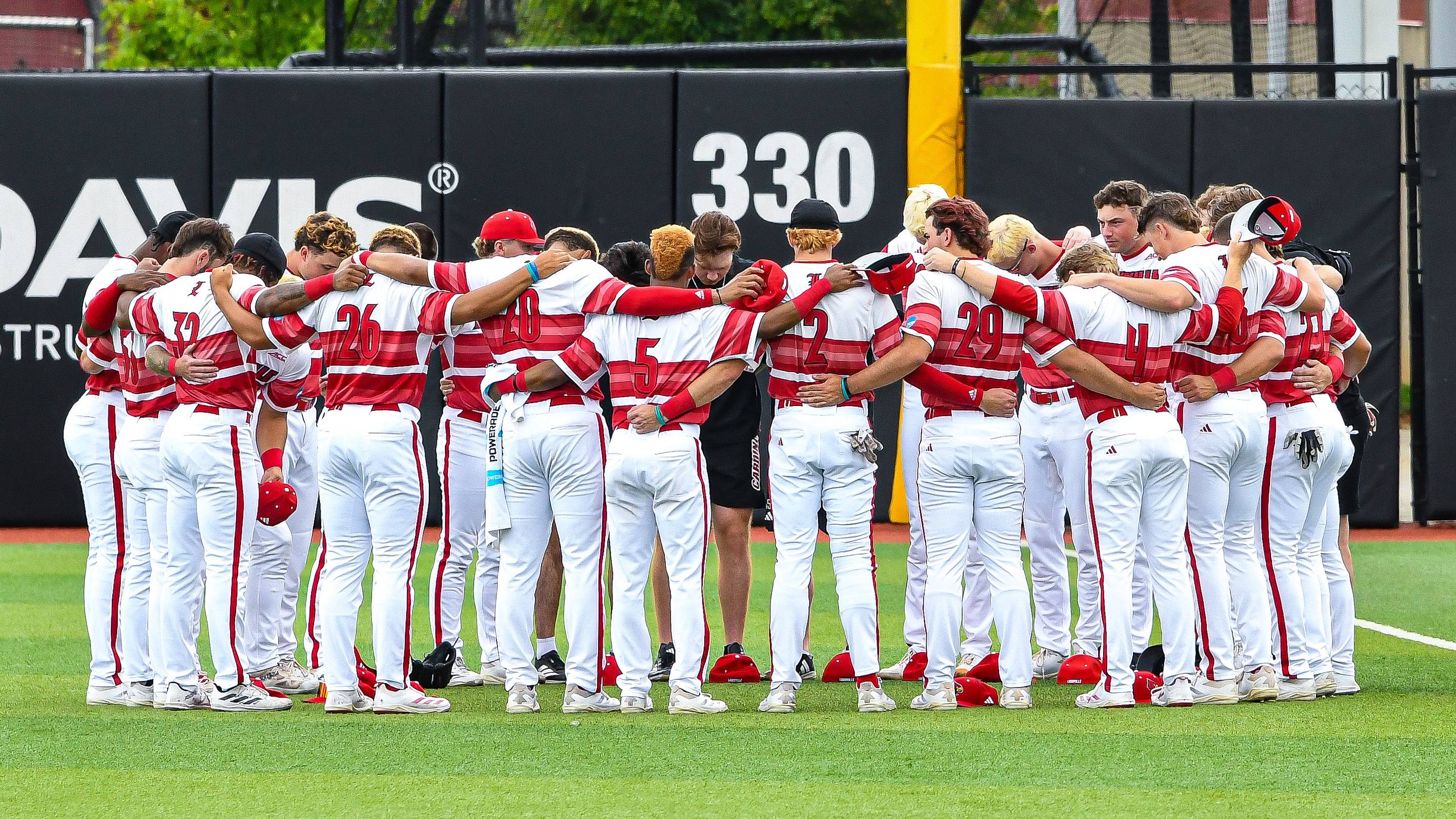Louisville baseball players vs. Miami in game two of the 2025 Louisville Super Regional.