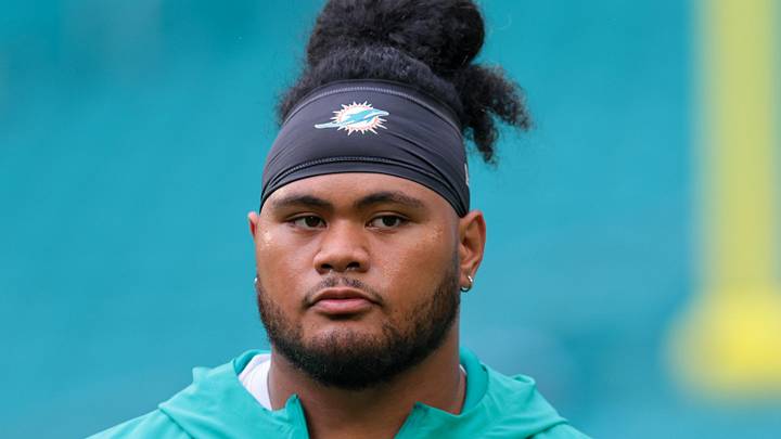 Miami Dolphins guard Jonah Savaiinaea