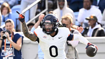 Oct 25, 2025; Chapel Hill, North Carolina, USA; Virginia Cavaliers safety Antonio Clary (0) celebrates after intercepting a pass near the end of the fourth quarter at Kenan Stadium. Mandatory Credit: Bob Donnan-Imagn Images