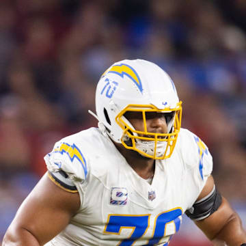 Oct 21, 2024; Glendale, Arizona, USA; Los Angeles Chargers offensive tackle Rashawn Slater (70) against the Arizona Cardinals at State Farm Stadium. Mandatory Credit: Mark J. Rebilas-Imagn Images