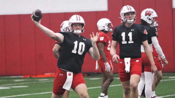 Wisconsin quarterback Tyler Van Dyke throws a pass during spring practice at the McClain Center in Madison, Wisconsin on Tuesday April 2, 2024.