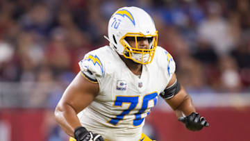 Oct 21, 2024; Glendale, Arizona, USA; Los Angeles Chargers offensive tackle Rashawn Slater (70) against the Arizona Cardinals at State Farm Stadium. Mandatory Credit: Mark J. Rebilas-Imagn Images