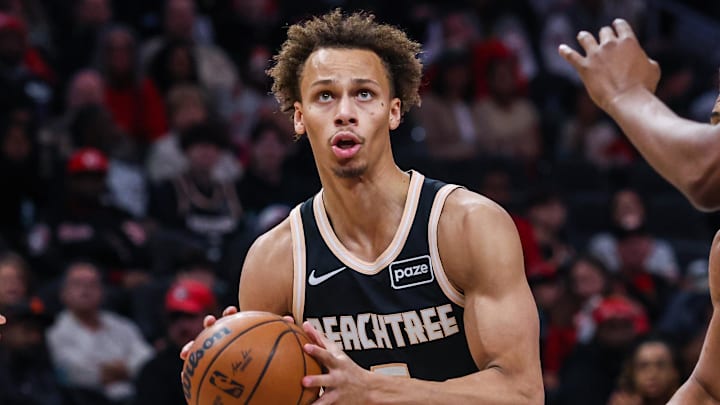 Jan 19, 2026; Atlanta, Georgia, USA; Atlanta Hawks guard Dyson Daniels (5) looks to the basket for a shot against the Milwaukee Bucks during the first quarter at State Farm Arena. Mandatory Credit: Jordan Godfree-Imagn Images