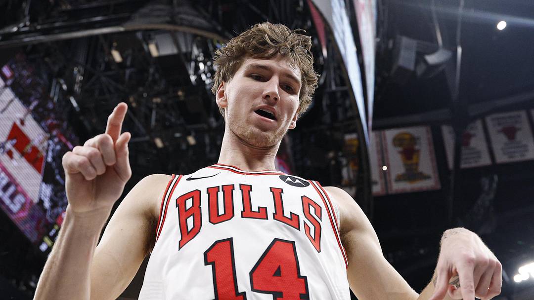 Nov 22, 2025; Chicago, Illinois, USA; Chicago Bulls forward Matas Buzelis (14) reacts after scoring against the Washington Wizards during the first half at United Center. Mandatory Credit: Kamil Krzaczynski-Imagn Images