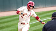 Cam Kozeal on the basepaths against Missouri State. The Razorbacks lost 14-13.