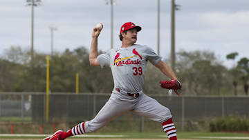 Feb 19, 2024; Jupiter, FL, USA; St. Louis Cardinals starting pitcher Miles Mikolas (39) delivers a
