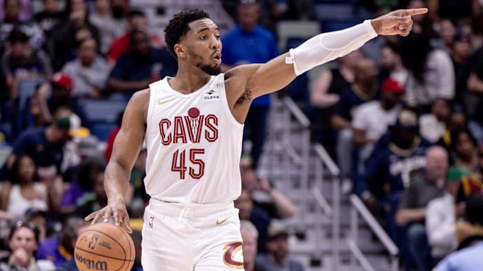 Mar 13, 2024; New Orleans, Louisiana, USA; Cleveland Cavaliers guard Donovan Mitchell (45) brings the ball up court against the New Orleans Pelicans during the first half of the game at Smoothie King Center.